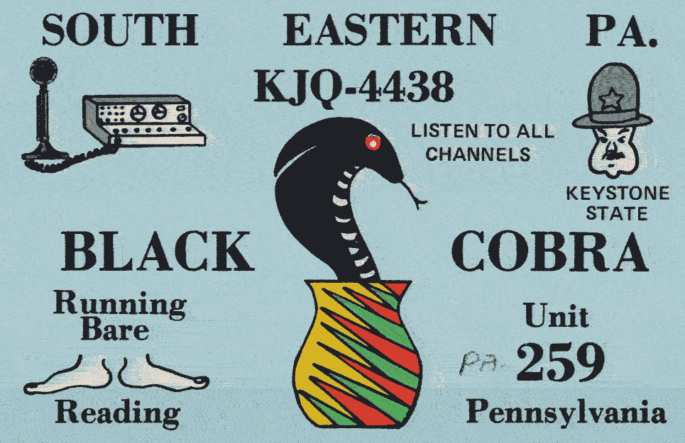 QSL card showing a cartoon black cobra.